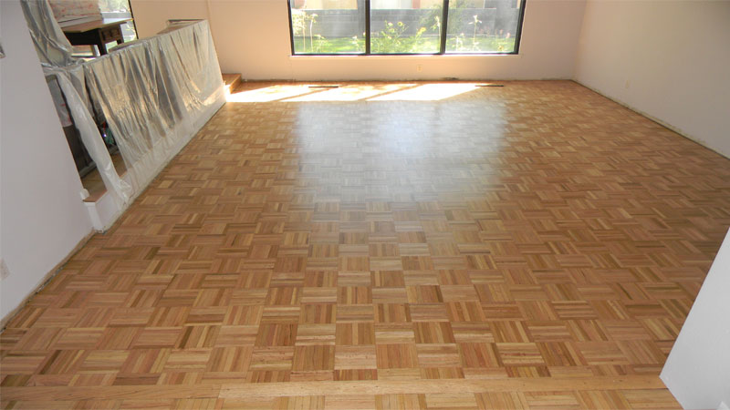 pemasangan lantai kayu motif mozaik
